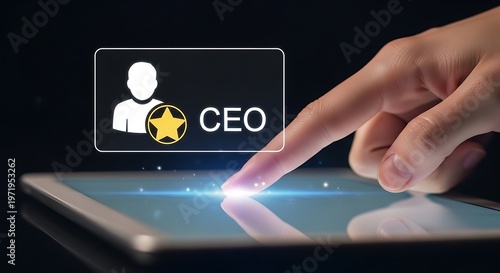 A hand interacting with a digital tablet displaying a holographic CEO icon and text, symbolizing leadership and technology.