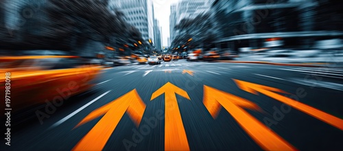 Streaks of orange arrows on a busy, blurred city street ahead
