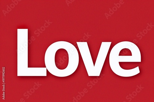 A red background with the word love cut out of paper