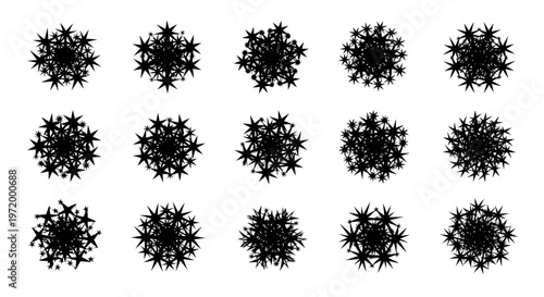 Collection of fifteen abstract black starbursts or snowflakes in a grid pattern isolated on a clean white background representing explosions energy bursts or festive winter