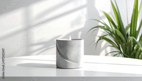Minimalist Concrete Candle on a White Surface with Shadows.