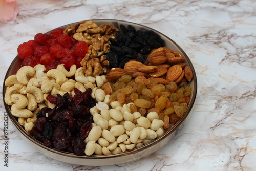 fruit and nut mixture beautifully arranged on a plate,