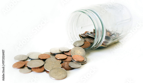 glass jar with coins