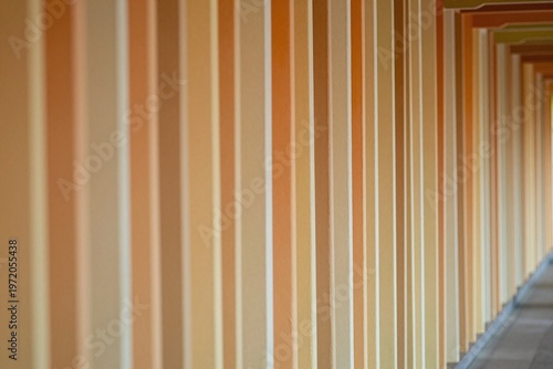 A blurry image of a long hallway in a building