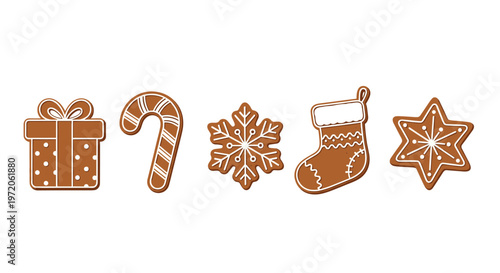 Selection of five decorated gingerbread cookies including a gift box candy cane snowflake stocking and star.