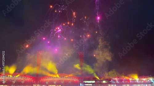 fireworks, colourful fire works lighting the night skies with vivid multi colours glowing colours of Easter Show of the fireworks producing beautiful lighting rainbow colourful effects Sydney NSW Aust