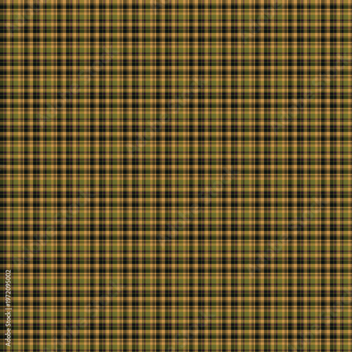 Seamless yellow and green plaid fabric pattern with a checkered vintage tartan design on cotton linen textile material for a picnic tablecloth backdrop