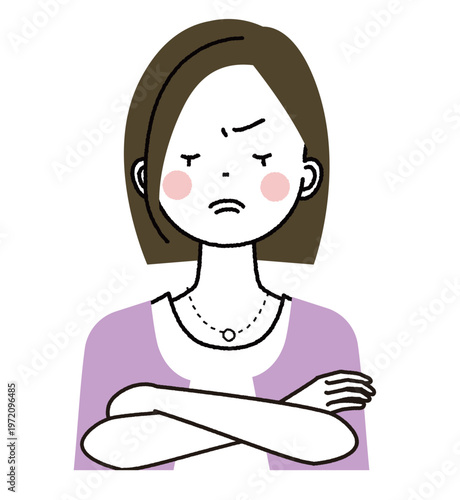 ボブヘアでオフィスカジュアルファッションの女性　険しい表情で腕組みをしている女性