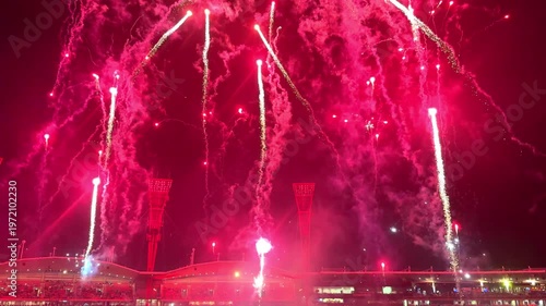 fireworks, colourful fire works lighting the night skies with vivid multi colours glowing colours of Easter Show of the fireworks producing beautiful lighting rainbow colourful effects Sydney NSW Aust