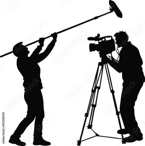 Silhouette of a professional film crew with a camera on a tripod and a boom microphone operator
