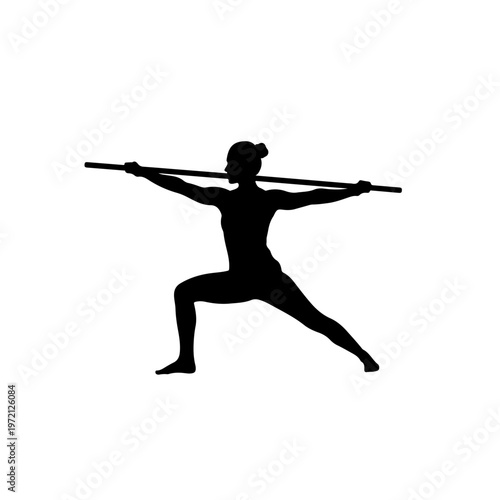 Woman practicing yoga, warrior pose with staff, healthy active lifestyle