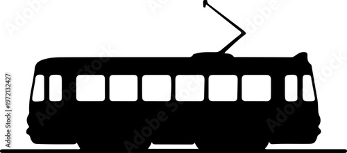 Silhouette of a vintage tram on a track, iconic urban transport