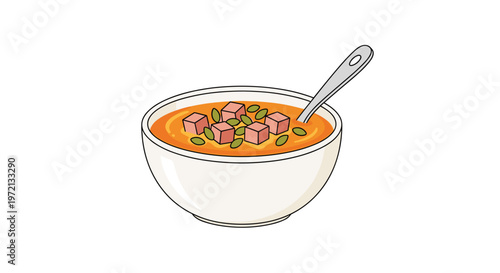Delicious bowl of creamy orange pumpkin soup features savory ham cubes and crunchy green seeds served with a silver spoon on a pristine white background.