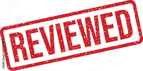 Bright red rubber stamp clearly displaying the word reviewed on a clean white background