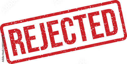 Red rubber stamp indicating a rejected status on a pristine white surface