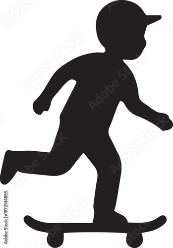 Black silhouette of a boy riding a skateboard