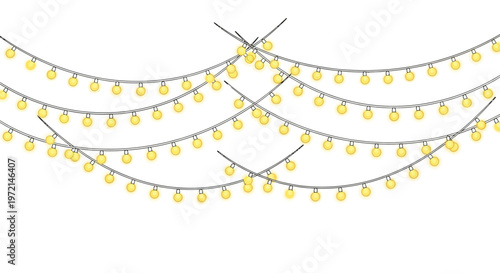 Strings of glowing yellow lights hanging against a white background