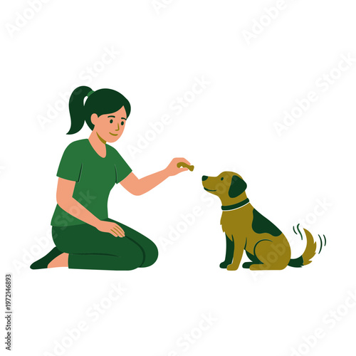 Woman gives treat to sitting dog outdoors in daytime happily