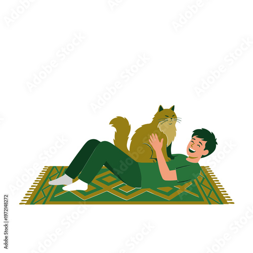 Man lying on a mat playing with a cat indoors