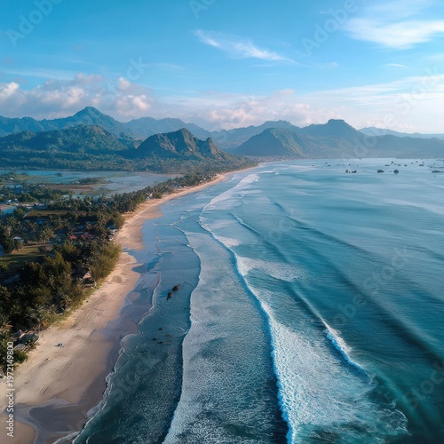 Scenic Beach with Mountain Backdrop Under Blue Sky and Cloudy Weather