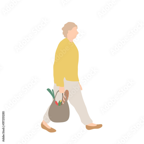 買い物袋を持って歩くシニア女性（一人での外出・日常）