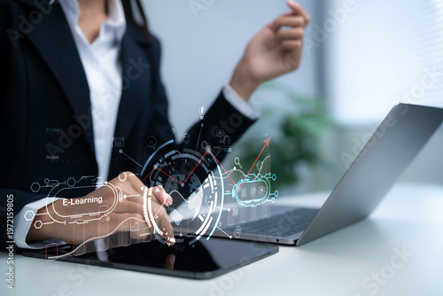 E learning digital education concept with smart interface on tablet showing global knowledge data analytics online training technology innovation in modern professional workspace
