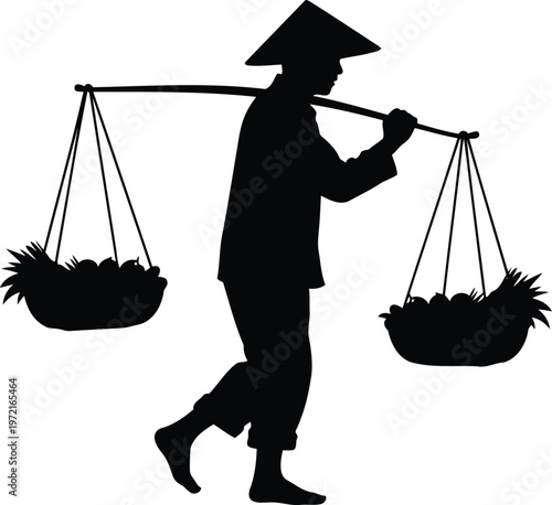 Silhouette of a traditional farmer carrying baskets filled with fresh produce on a shoulder pole