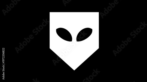 Black background featuring a white geometric shape with two oval-shaped eyes