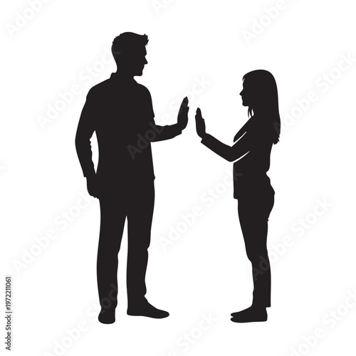 Man and woman standing facing each other with stop hand gesture symbolizing conflict dispute or social distancing