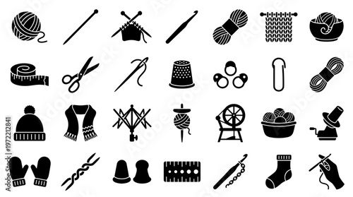 Collection of knitting and crochet crafting tools and supplies for handmade textile art and sewing projects