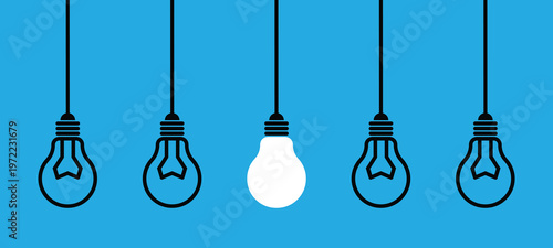 Creative Idea Concept with One Glowing Light Bulb Among Hanging Lamps Minimal Design