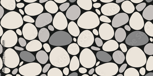 A mesmerizing abstract pattern of smooth, rounded stones, evoking a sense of organic harmony and tactile texture.