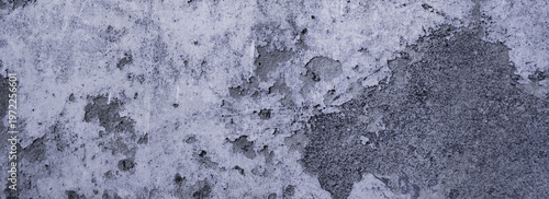 The texture of the old concrete hair cladding that was used as the design and text background.	