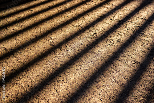 วันที่ส่ง: 15 เมษายน 2569

คำอธิบาย
The reflection of a steel cage on the rough concrete floor. A concept of being condemned and deprived of freedom. Isolation and fear. Background image for text illu