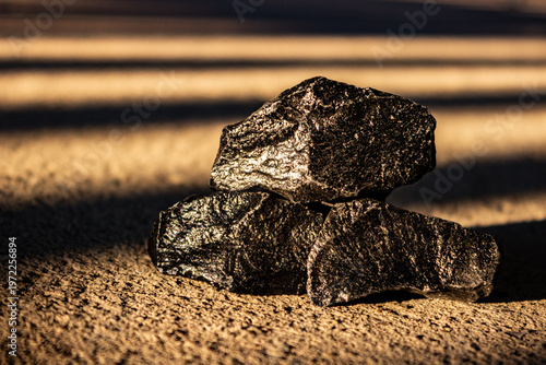 A photograph of coal lumps and natural energy. Clean energy. Global resources.