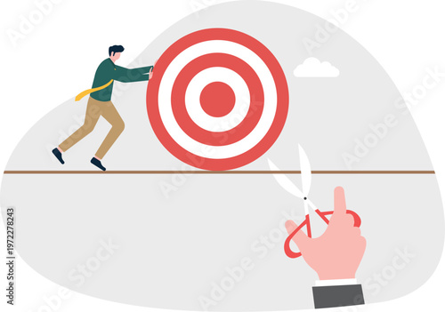 Professional pushing a giant target and scissors cutting the path