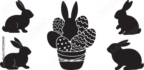 Easter bunny silhouettes with decorated eggs in basket
