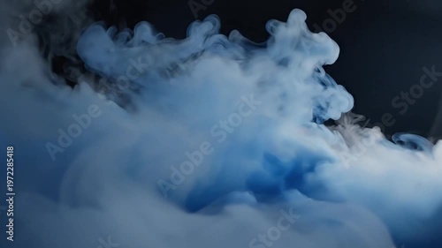 Abstract blue smoke swirls and clouds, ethereal mist, dark background, atmospheric motion