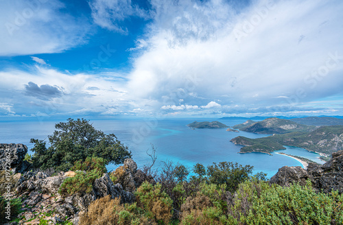 The scenic views of the Ölüdeniz, which is a resort village on the southwest coast of Turkey, known for the blue lagoon and the wide, white Belcekız Beach. On the route of the Lycian way to the Babada