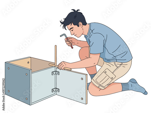 Young man assembling a wooden box with a hammer.