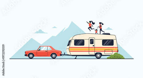 Adventurous family jumping joyfully on the roof of their camper trailer during a camping trip in the mountains.