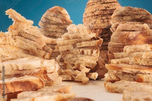 Slika na platnu Exploring a surreal scene where sliced bread forms towering canyon shapes, creating a delightful and unexpected landscape