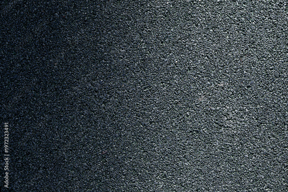 Fototapeta premium background texture of dark gray asphalt, top view