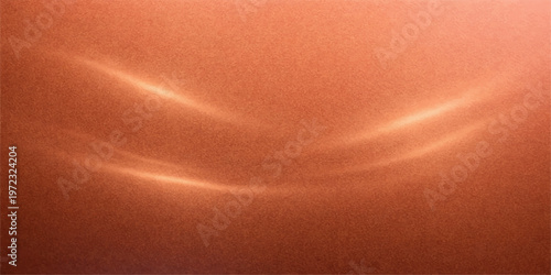 A luxury abstract background texture features soft flowing waves of silk and satin fabric with a smooth gold and orange shine for a high-end textile backdrop design