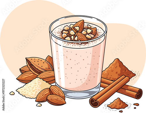 Delicious almond milk smoothie in a glass, garnished with almonds and cinnamon, surrounded by ingredients.