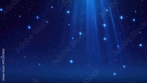 Magical Blue Light Beams Shining Down on Starry Night Sky.