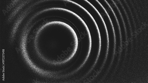 Concentric circles made of stippling dots forming ripple waves on dark background. Radial ripple pattern created from thousands of individual dots. glowing concentric circles in monochrome grain style