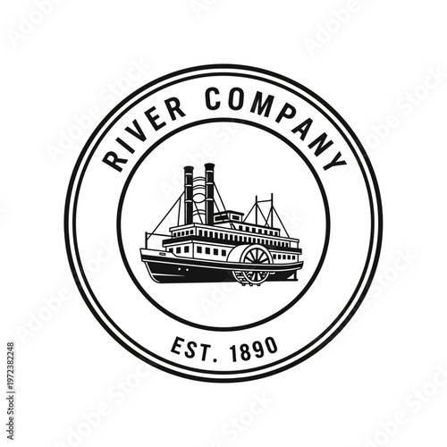 A circular black and white logo featuring a vintage paddlewheel steamboat with 'RIVER COMPANY EST. 1890' text.
