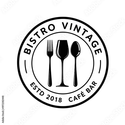 Circular logo for Bistro Vintage, featuring a fork, wine glass, and spoon, with text indicating "Bistro Vintage Estd 2018 Cafe Bar".