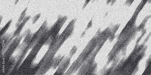 Abstract monochrome background with blurred diagonal dark brush strokes and a fine grainy texture, offering a soft yet dynamic visual for artistic applications and design